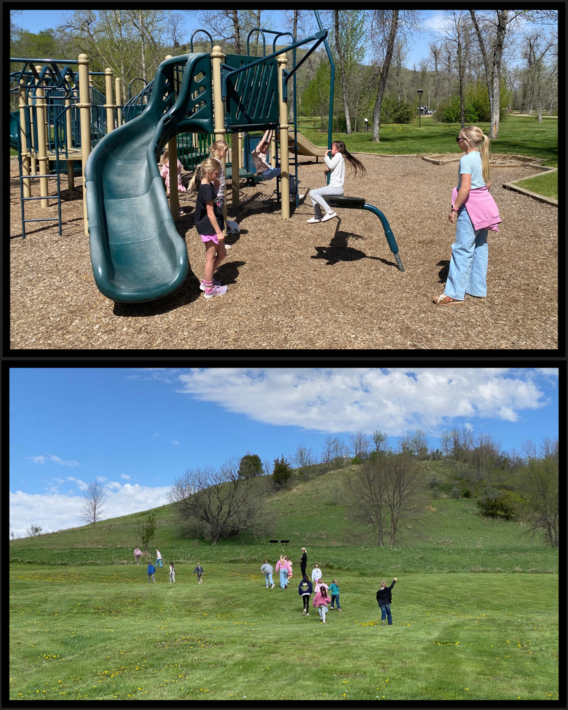 Students playing on a playground and on a hill