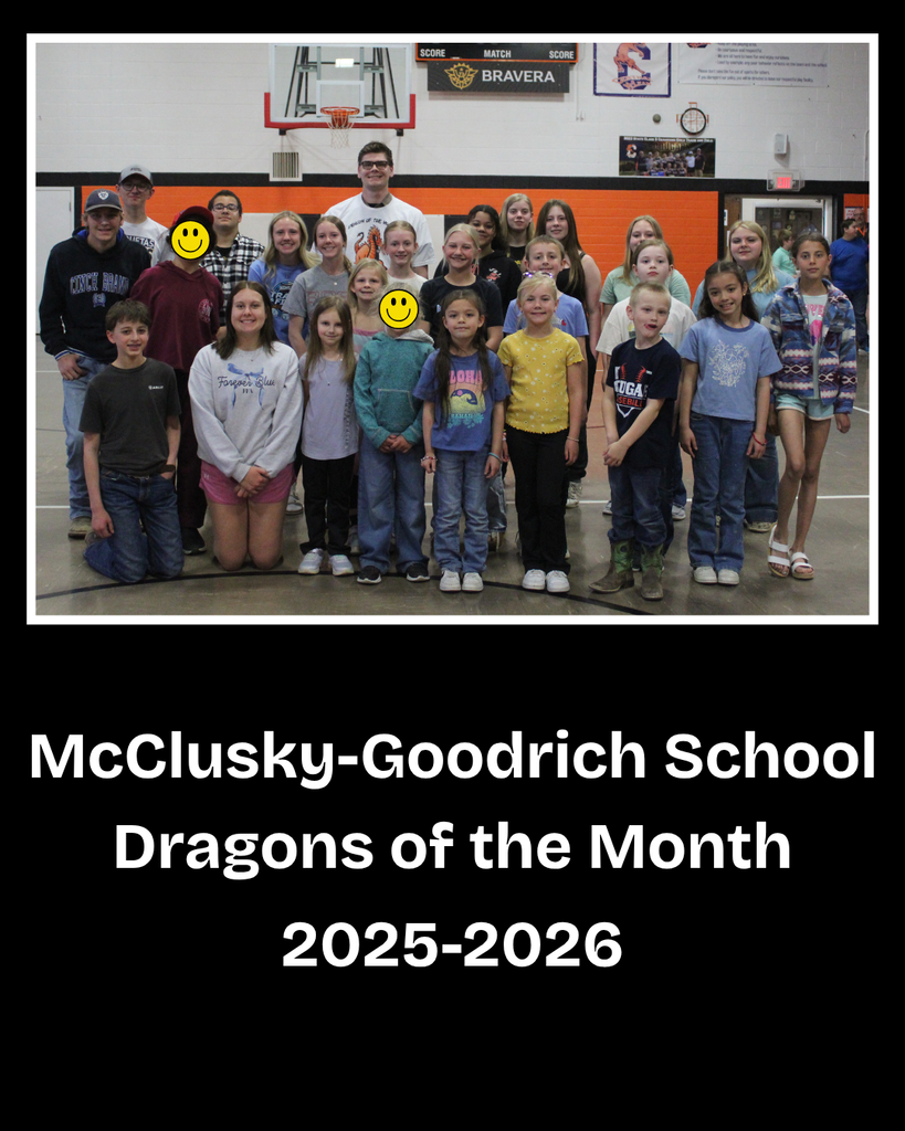 Deputy Thompson standing with the Dragons of the Month for the school year