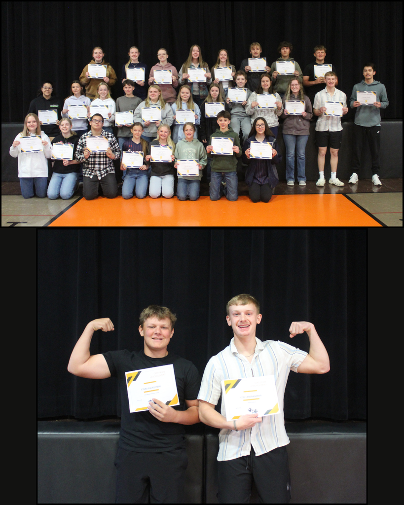 High school students posing with award certificates