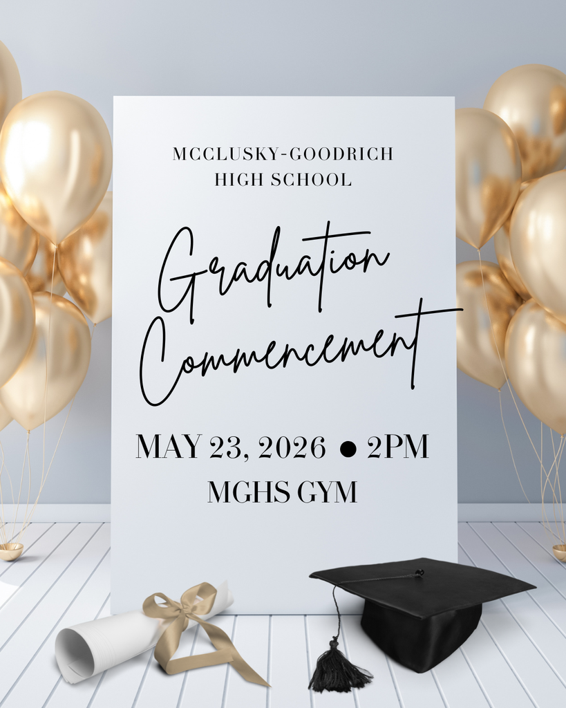 A sign announcing the graduation commencement with a mortarboard and rolled up diploma in front