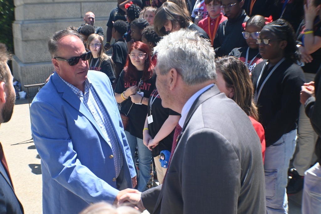 Handshake with Dr. Hopkins.