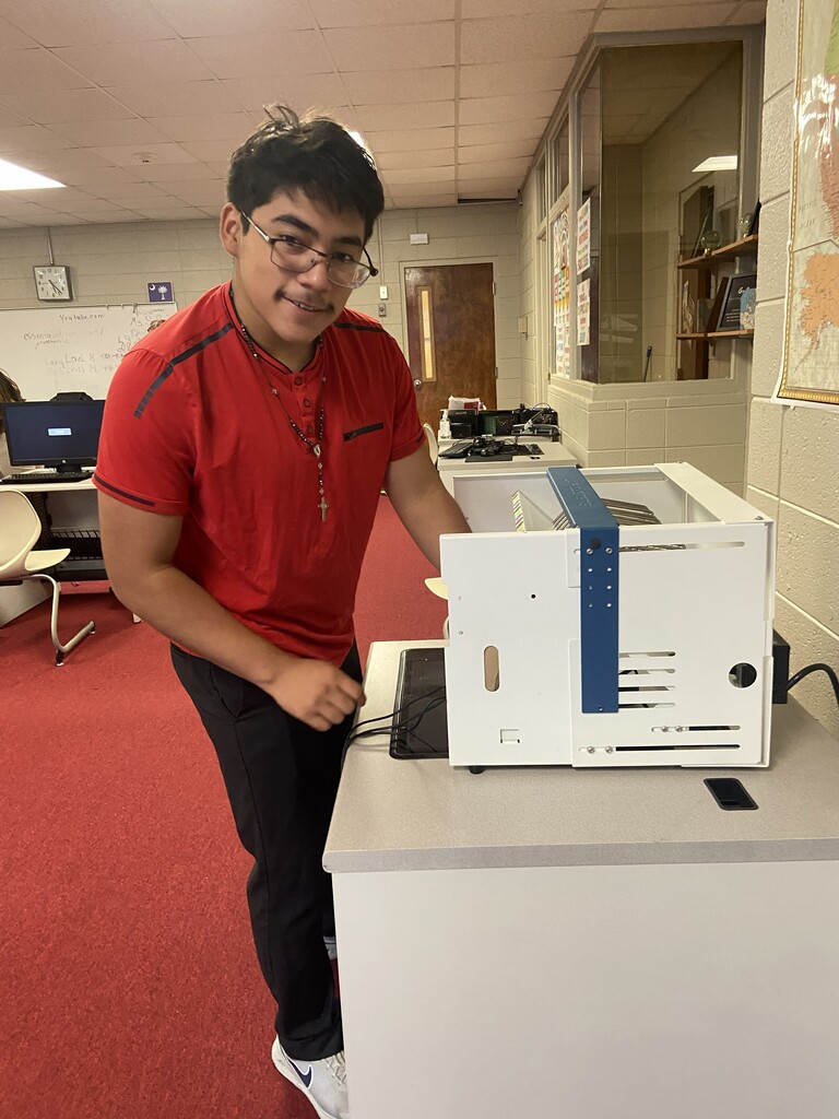JROTC setting up desktops for adult ed