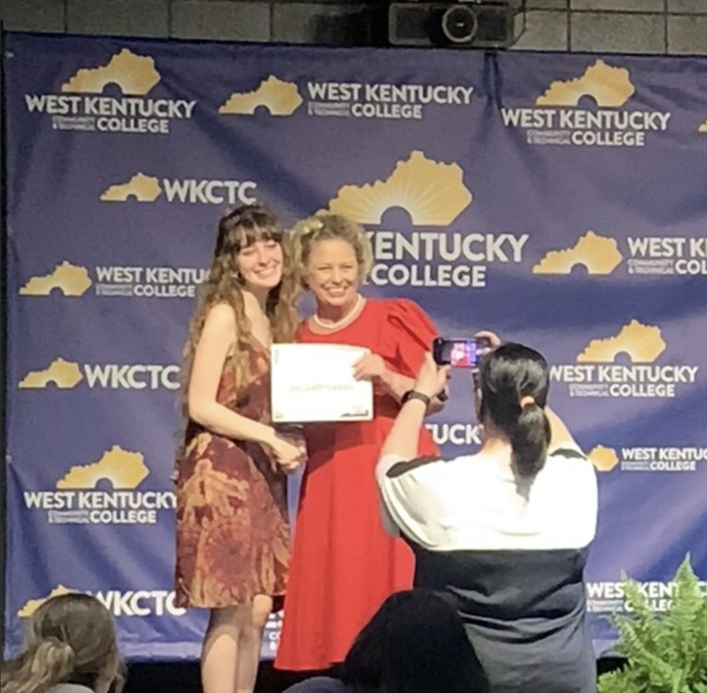 Delany recently entered the One Book Read contest at West Kentucky Community and Technical College and made her mark by submitting three original poems in the student category—competing alongside both college and Dual Credit students. Her talent and creativity earned her an Honorable Mention!