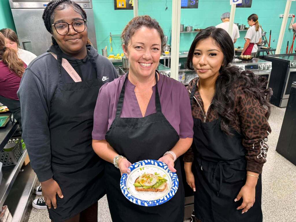 Ever watched a principal get taught by a student? In Mrs. Woodruff’s Culinary 2 class, students tried poaching eggs for the first time while also practicing creative plating and garnishing. Our Academy of Technology, Business, and Hospitality Principal, Mrs. Irvan, jumped right in—and one of our students got the chance to show her how it’s done! 🔥 Her final dish turned out pretty egg-cellent! 💯 We love seeing the teamwork, confidence, and hands-on learning happening in our classrooms every day.