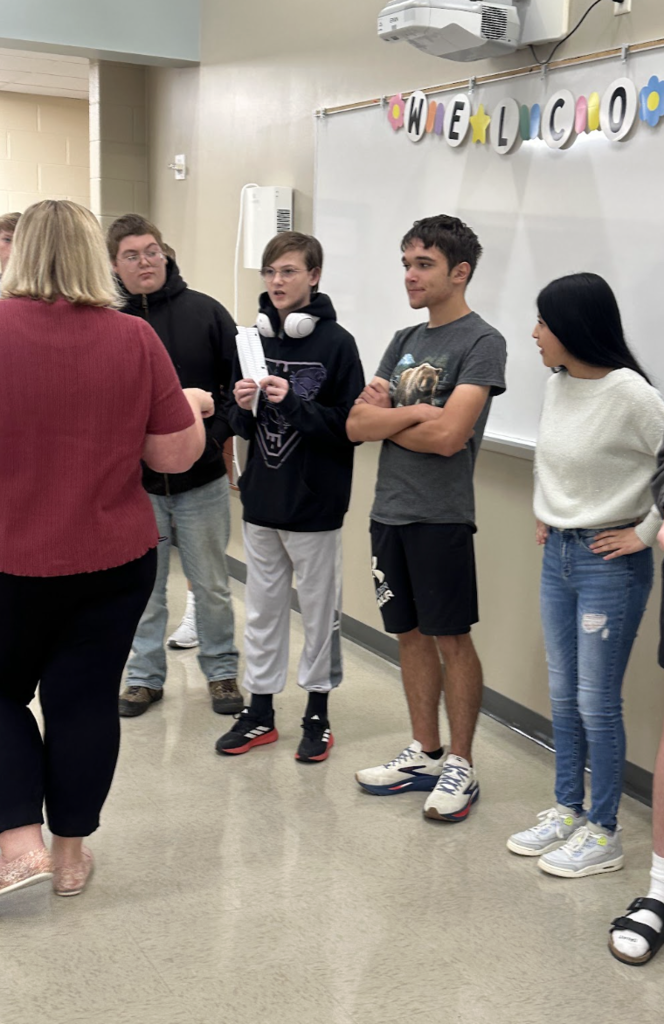 Learning Spanish from A to Z! Mrs. Reside’s Spanish I students have been learning the Spanish alphabet. After practicing the letters and their pronunciation, they took their practice to the next level by spelling out the letters in human form! It’s a fun, hands-on way to reinforce pronunciation, letter recognition, and teamwork while bringing Spanish to life in the classroom. ¡Buen trabajo, Mustangs!