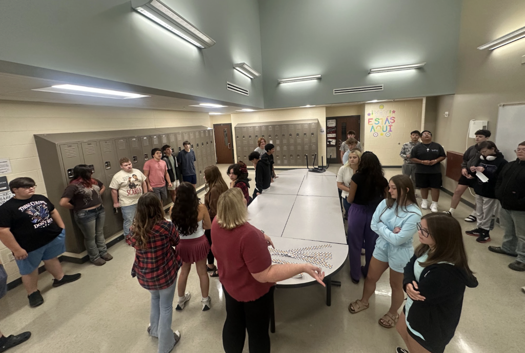 Learning Spanish from A to Z! Mrs. Reside’s Spanish I students have been learning the Spanish alphabet. After practicing the letters and their pronunciation, they took their practice to the next level by spelling out the letters in human form! It’s a fun, hands-on way to reinforce pronunciation, letter recognition, and teamwork while bringing Spanish to life in the classroom. ¡Buen trabajo, Mustangs!