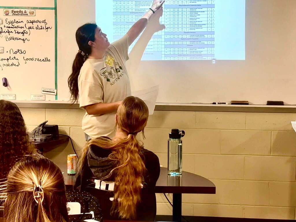 Through photos from real inspections and a hands-on “food safety crime scene,” students got to play inspector for the day and identify real hazards in food service settings.