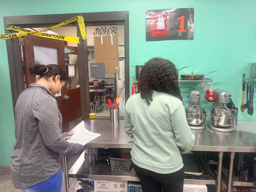 Through photos from real inspections and a hands-on “food safety crime scene,” students got to play inspector for the day and identify real hazards in food service settings.