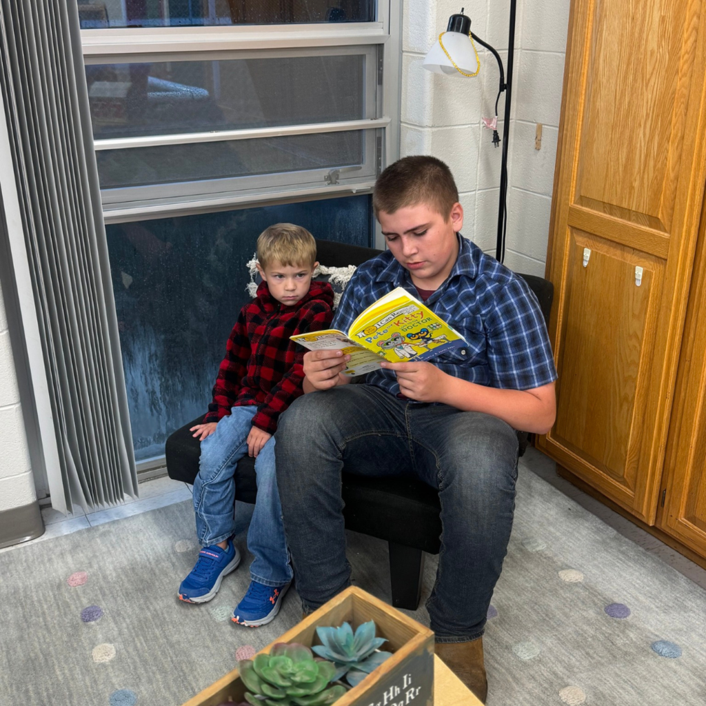 two boys reading