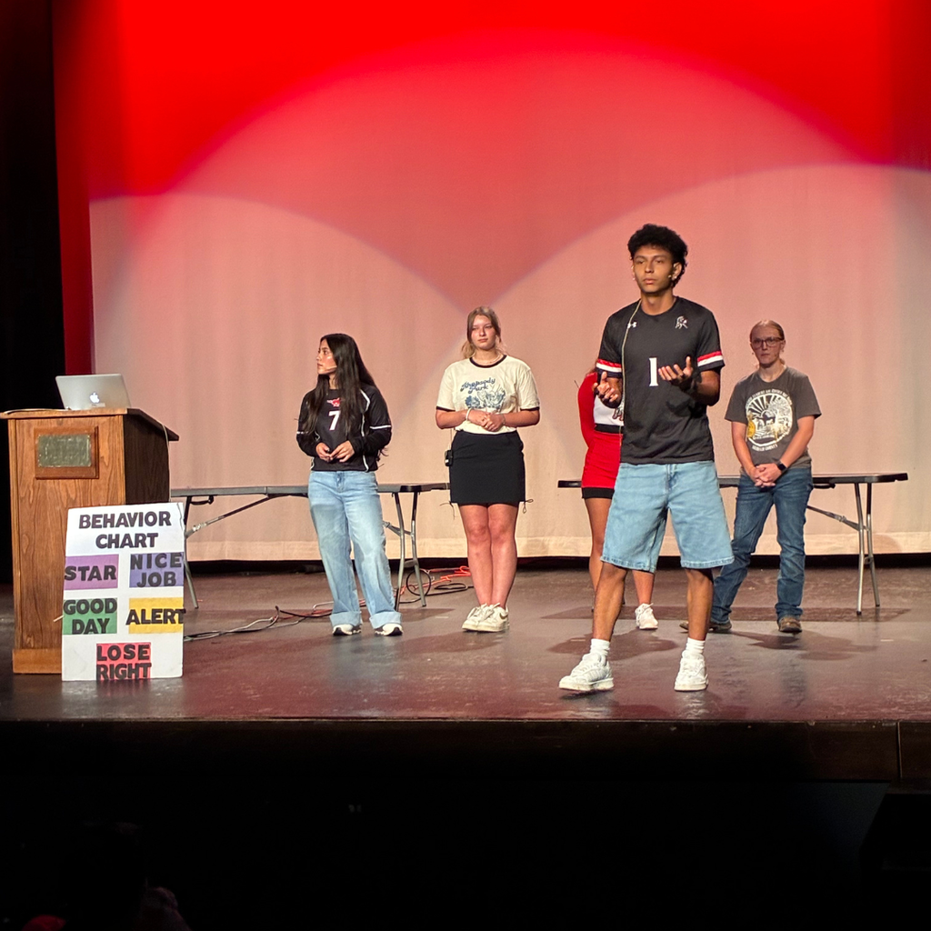kids talking on stage