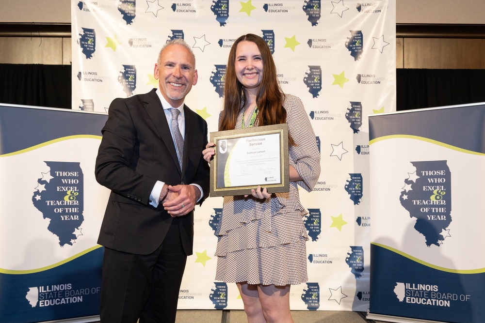 MCHS social science Instructor Kathryn Larson with ISBE State Superintendent Tony Sanders