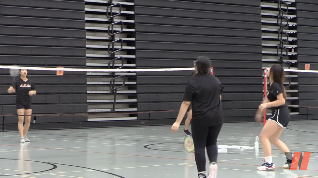 Students playing badminton