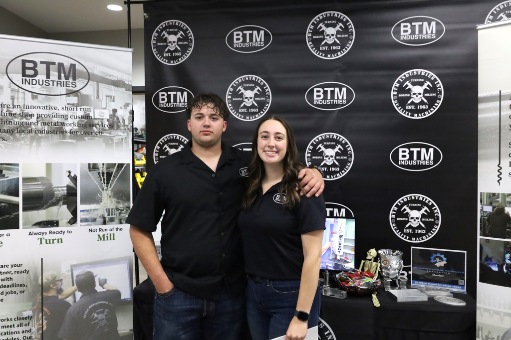 Two people at BTM Industries