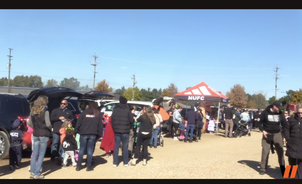 People waiting in line at the drive-in