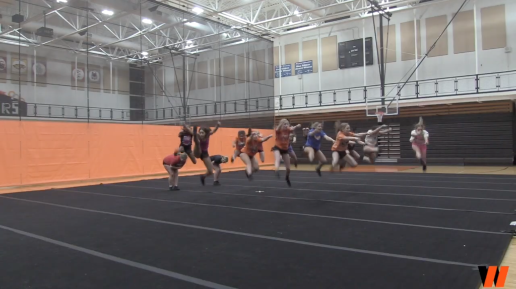 Cheerleaders jumping