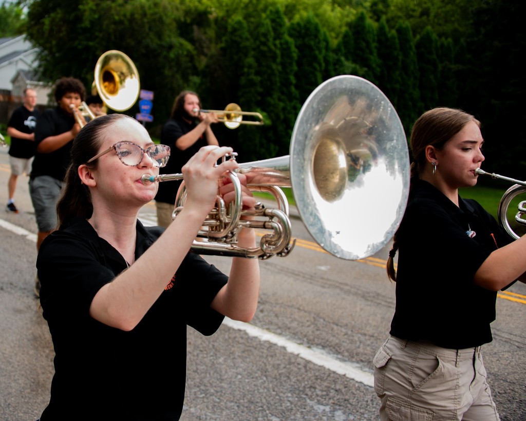 MCHS Marching Band and Color Guard members in the July 4 parades