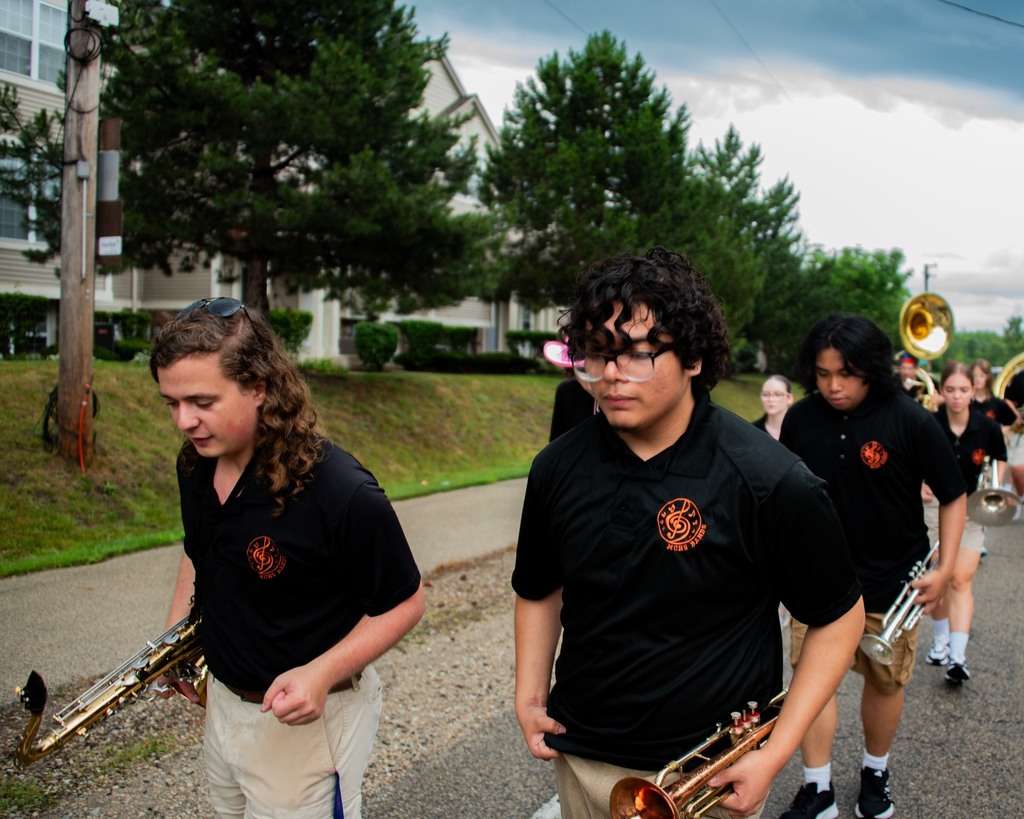 MCHS Marching Band and Color Guard members in the July 4 parades