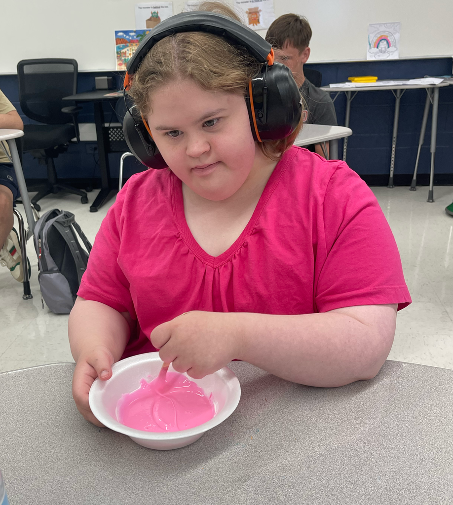 Student stirring slime