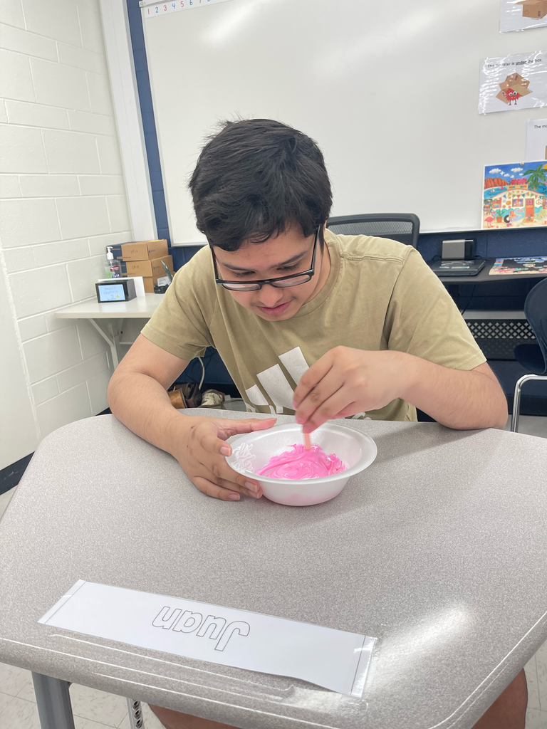 Student stirring slime