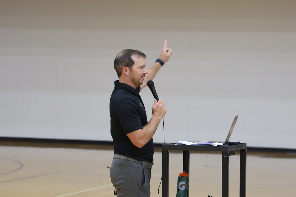 Mr. Sterner speaking on a microphone