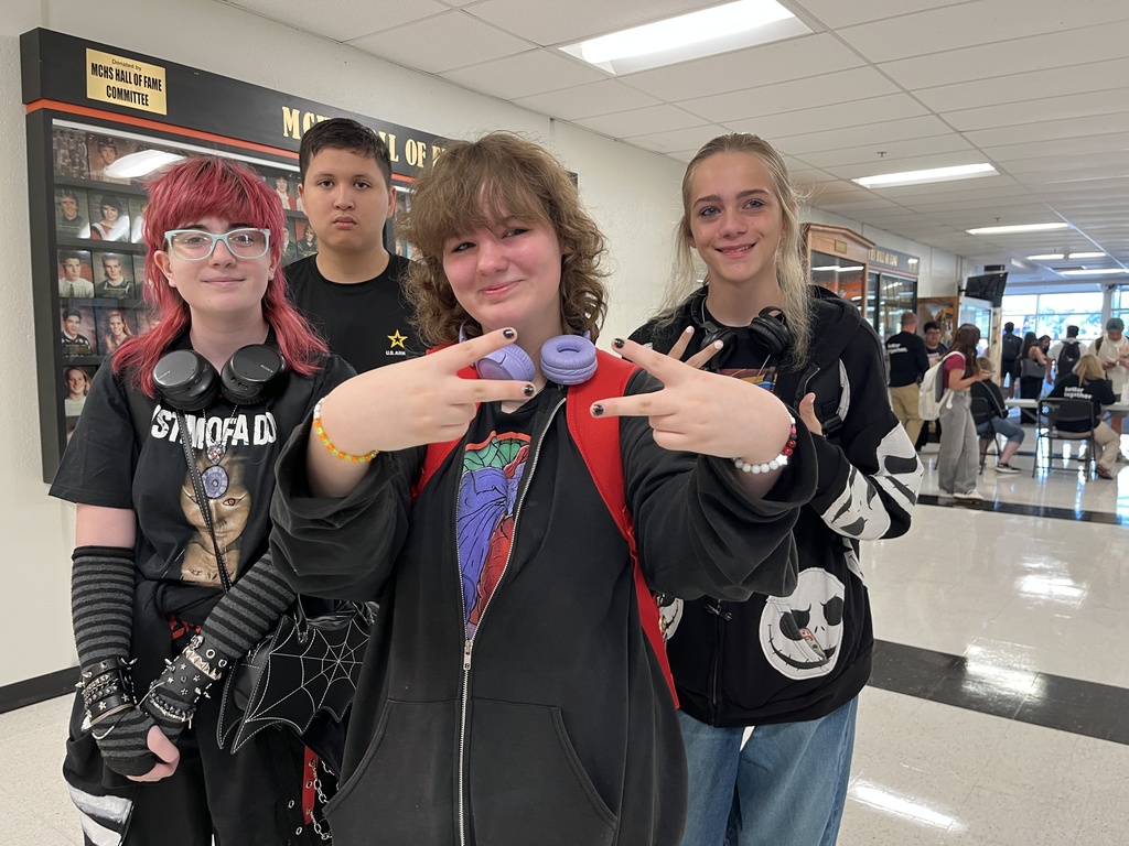 Four students posing 