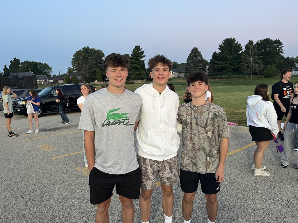 Three seniors standing together 