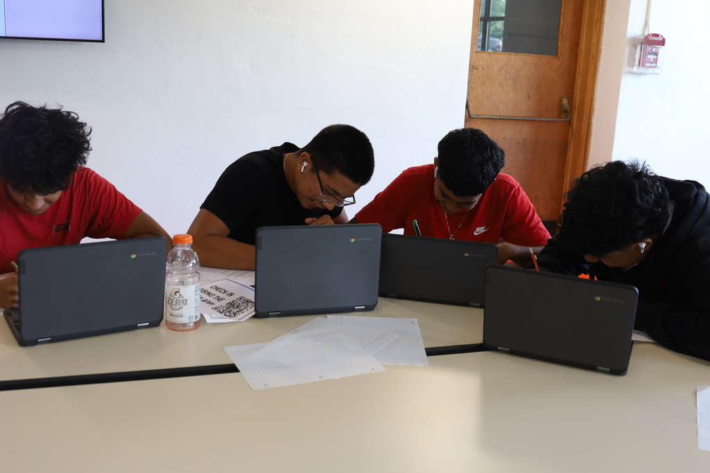Students writing letters
