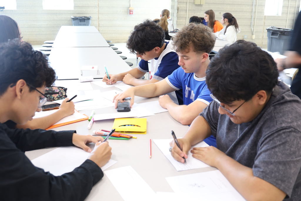 Students writing letters