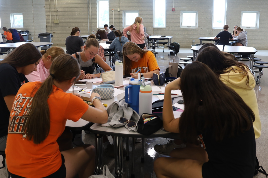 Students writing letters