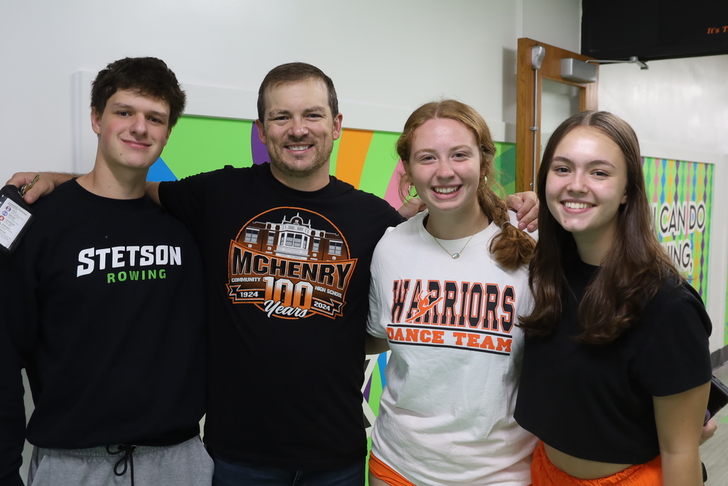 Principal sterner with three seniors 