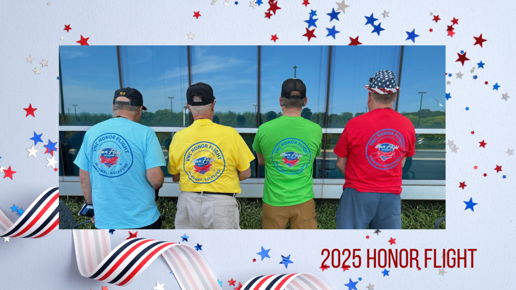 Four veterans with their back facing the camera that says VNC Honor flight
