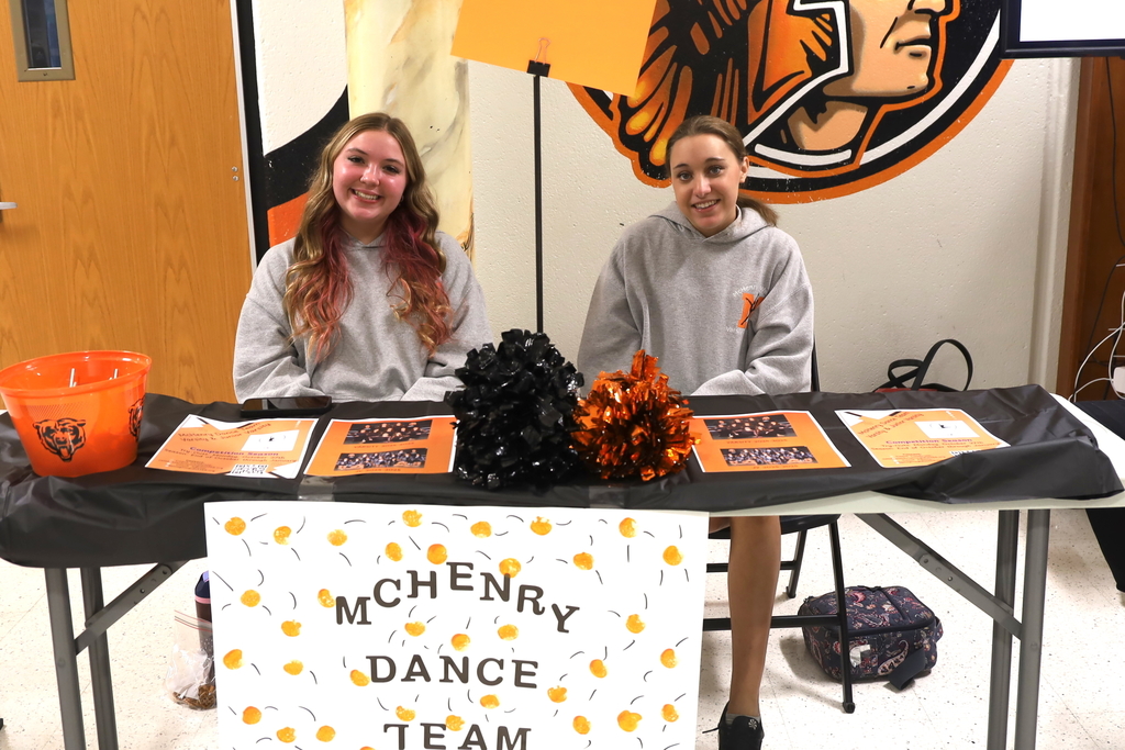 McHenry Dance Team booth with two students