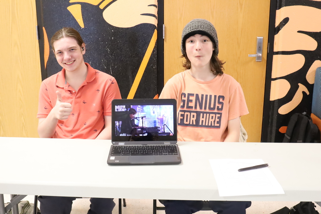 two students with a laptop and video 