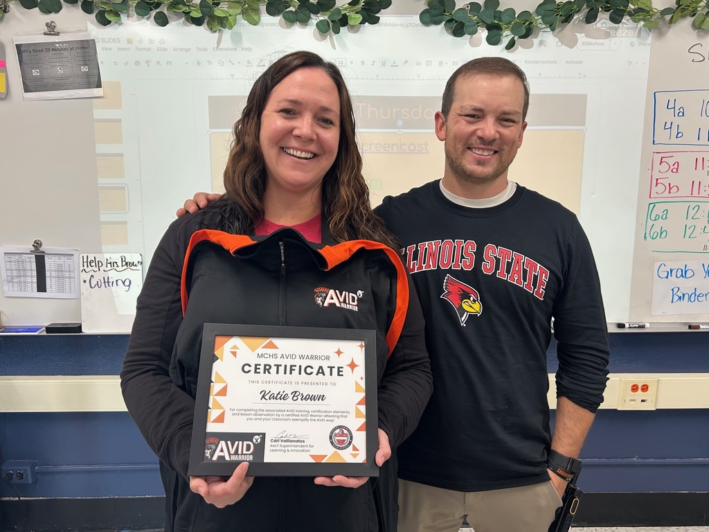 Katie Brown with AVID certificate and principal