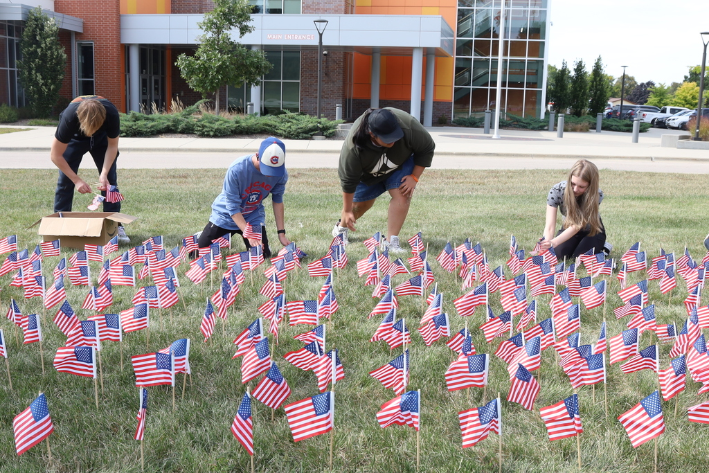 Students setting up the flags