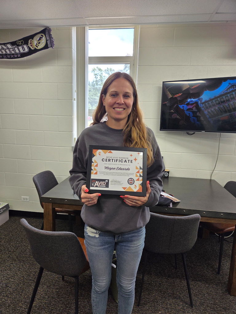 Megan Edwards with AVID certificate