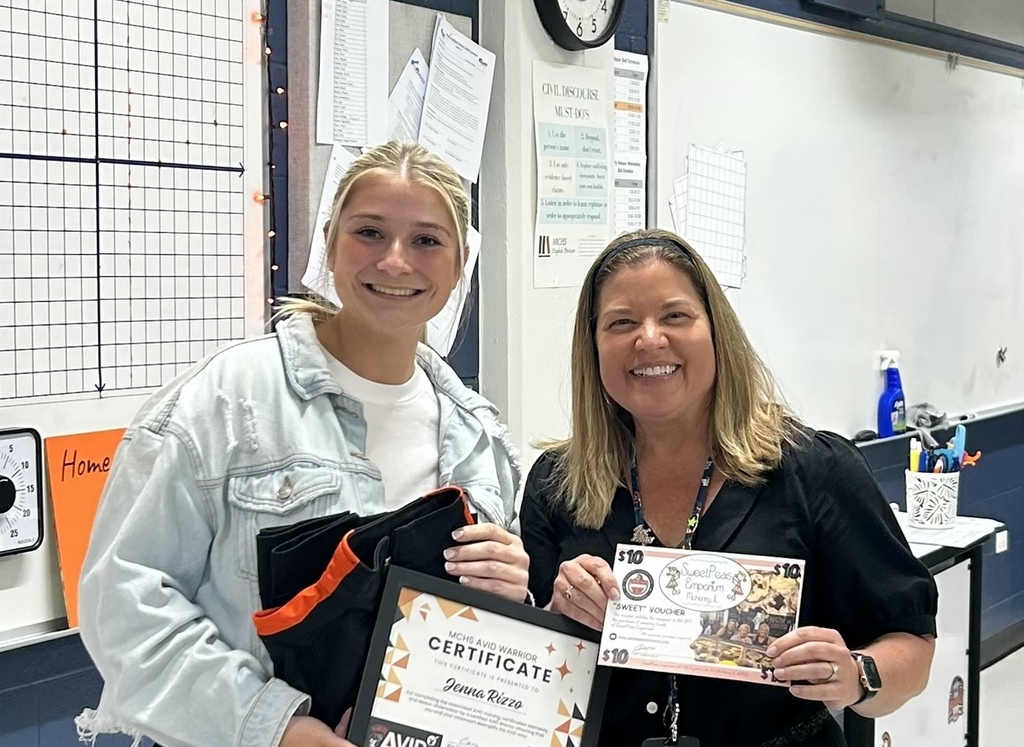 Jenna Rizzo and Heidie Dunn. Jenna holding her certificate. 