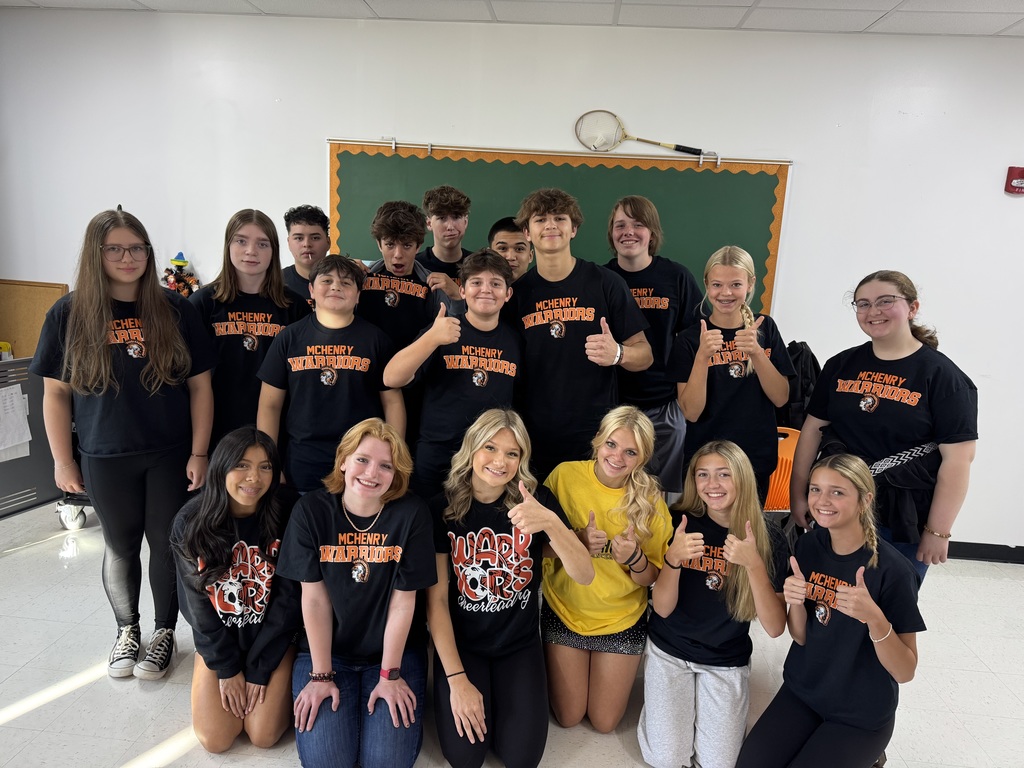 Photo of students in Mrs. Harris intro to Business class wearing their Warrior gear for game day