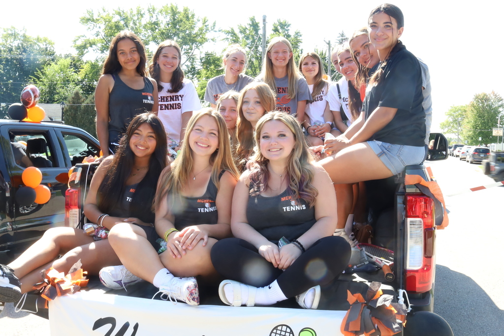 Tennis girls on the back of a truck