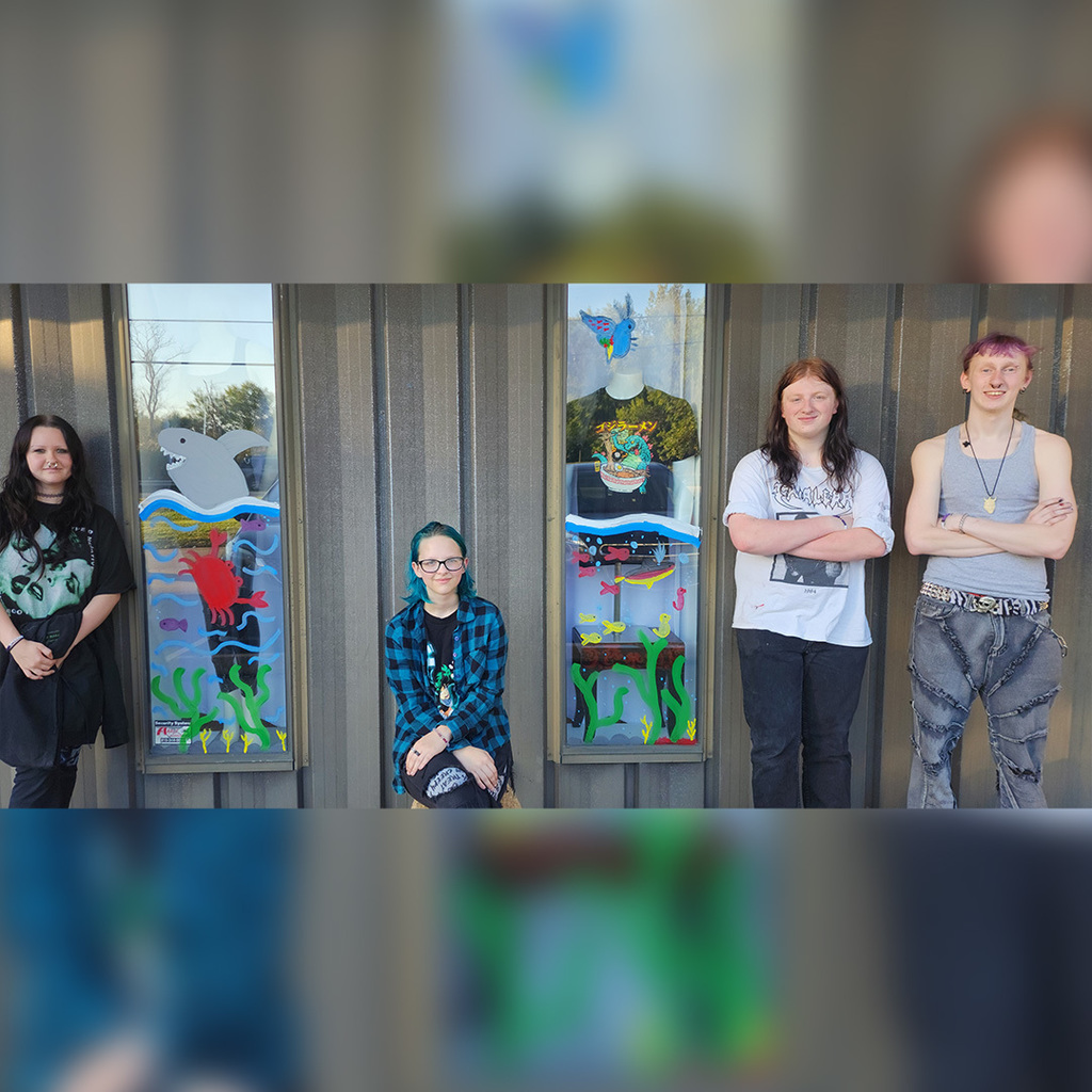 Students in front of windows