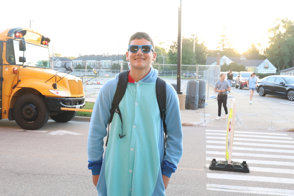 Student in blue onesie