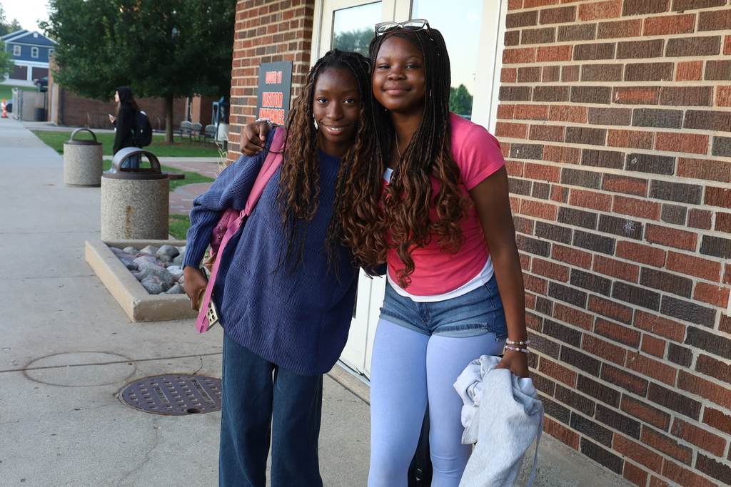 Two students in blue 