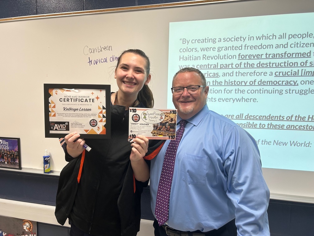 Carl Vallinatos with Kathryn Larson and her certificate 