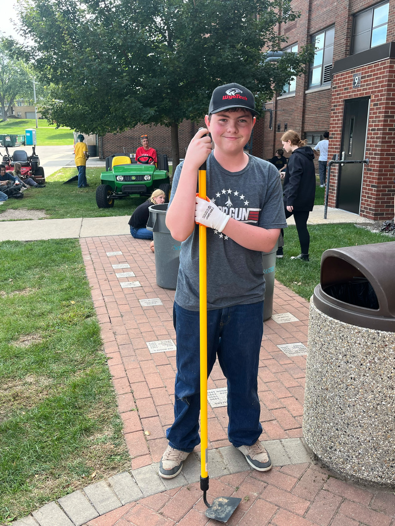 Student with garden tool 