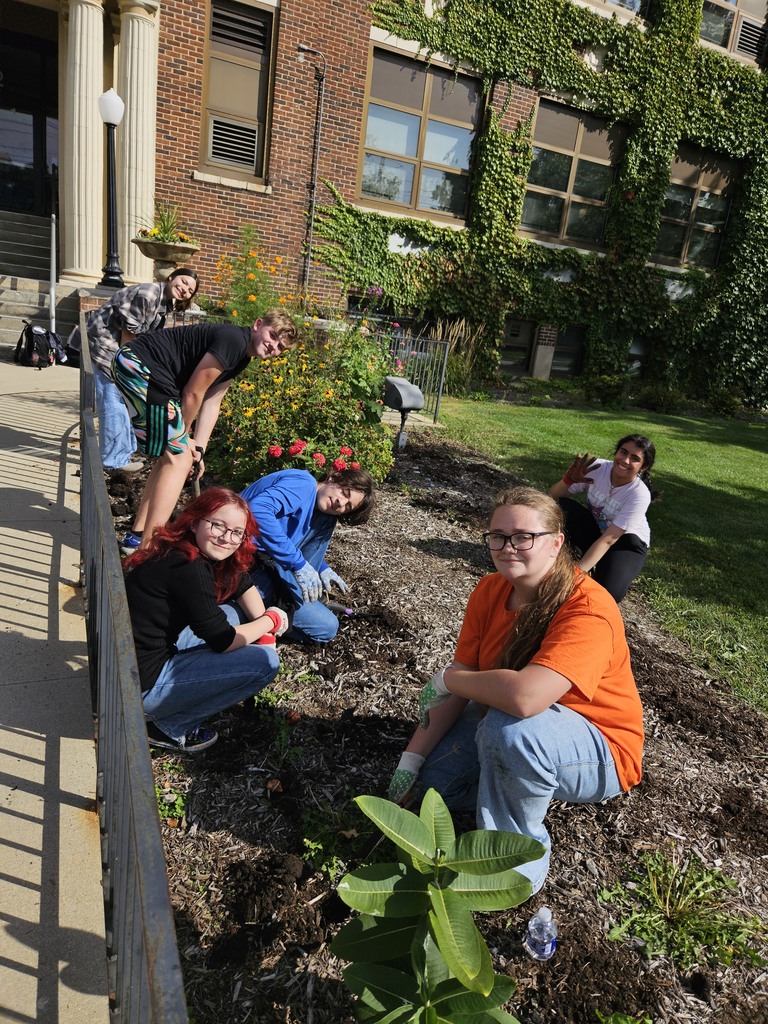 Students by the garden