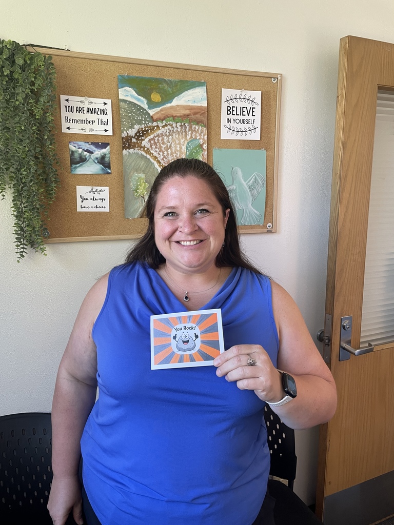 Leah holding you rock card 