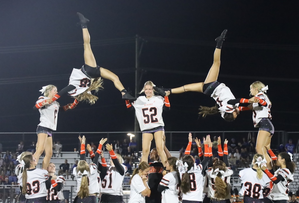 Cheerleaders doing a stunt 