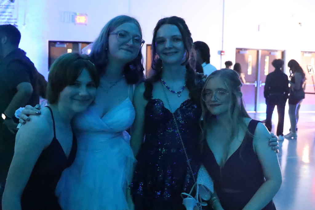 Four students smiling 