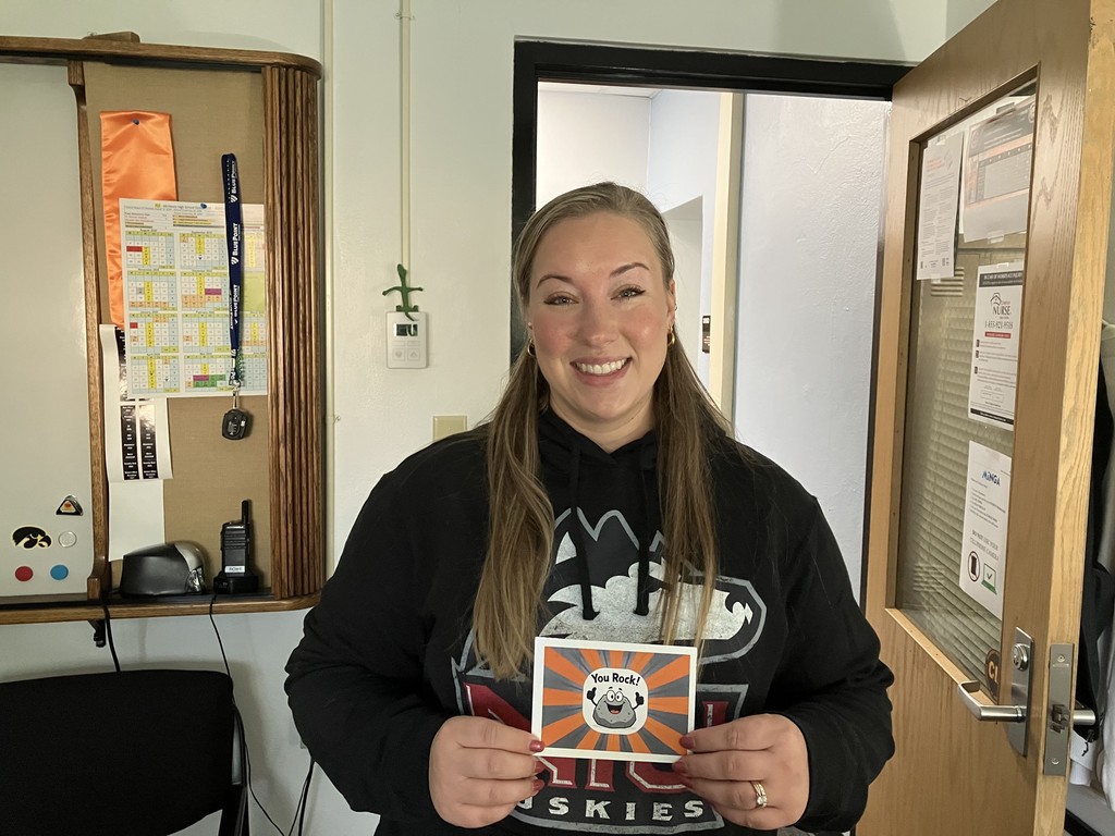 Dana holding "You Rock" card