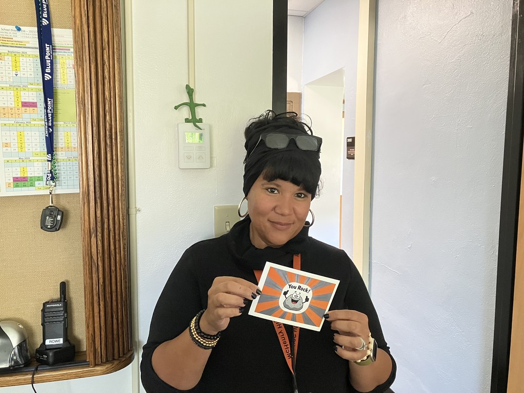 Karen Lawlor holding "you rock card"